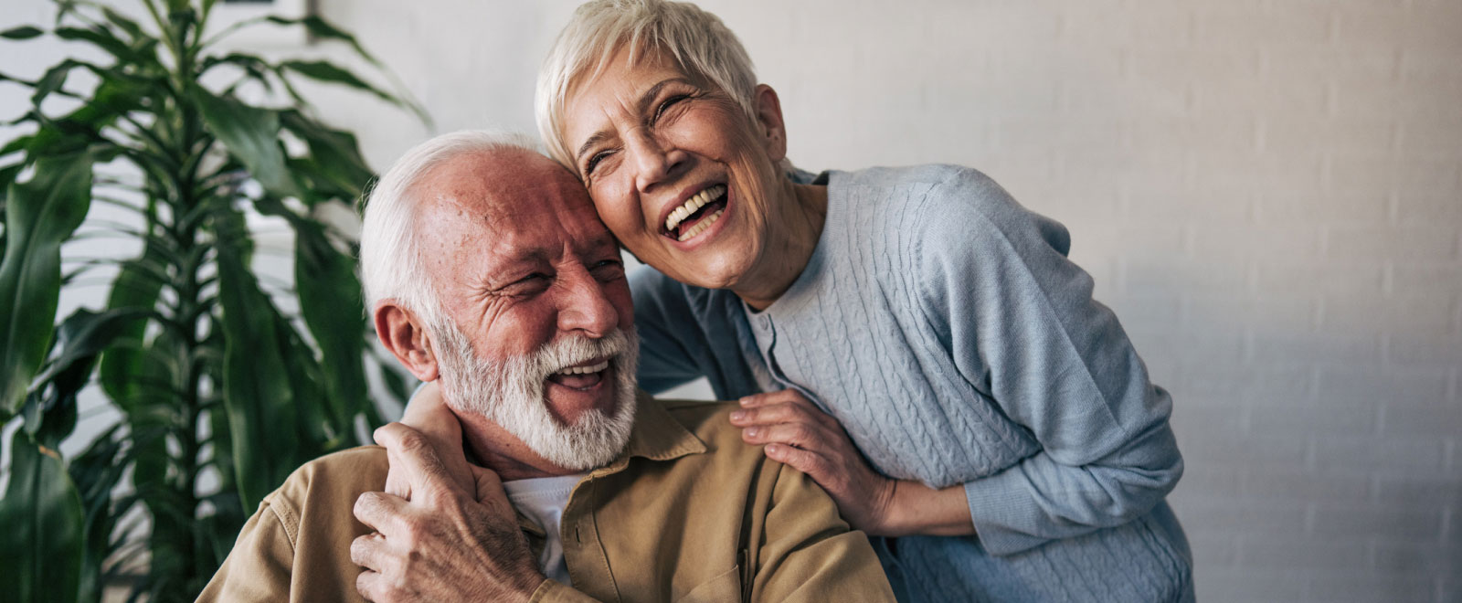 mature couple hugging and smiling 
